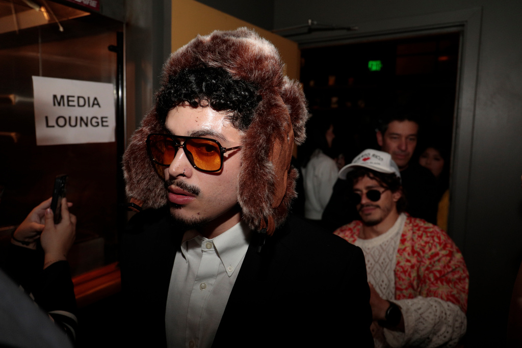 Contestants line up at the Bad Bunny look-alike contest line up at Tacolicious in San Francisco, Thursday, Feb. 5, 2026. (Giselle Garza Lerma/San Francisco Chronicle via AP)