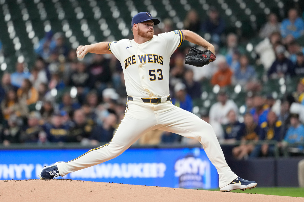 Milwaukee Brewers' Brandon Woodruff pitches during the first inning of a baseball game against the Tampa Bay Rays, Tuesday, March 31, 2026, in Milwaukee. (AP Photo/Aaron Gash)