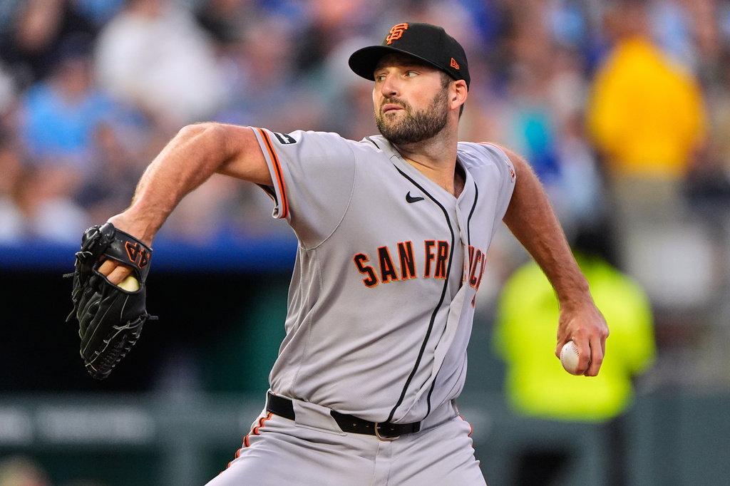 San Francisco Giants pitcher Sam Hentges throws during the sixth inning of a baseball game against the Kansas City Royals, Tuesday, July 21, 2026, in Kansas City, Mo. (AP Photo/Charlie Riedel)