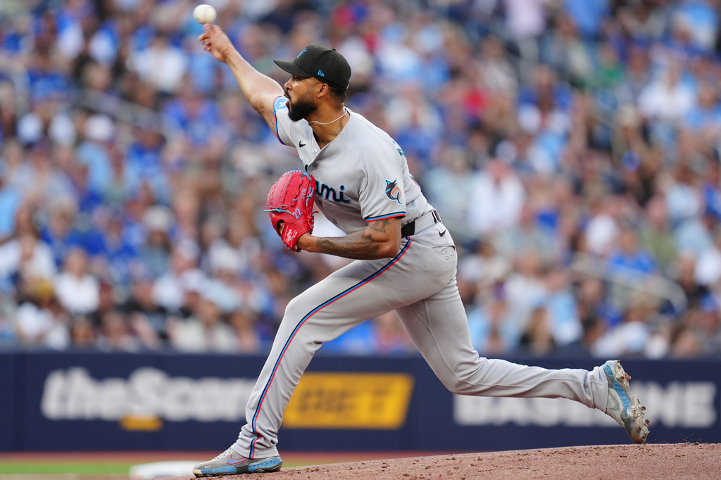 Miami Marlins pitcher Sandy Alcantara (22) makes a pitch against the Toronto Blue Jays during first inning of a baseball game in Toronto on Tuesday May 26, 2026. (Frank Gunn/The Canadian Press via AP)