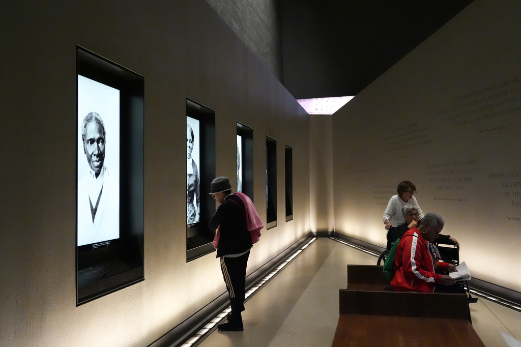 People visit the Smithsonian's National Museum of African American History and Culture, Wednesday, Sept. 23, 2026, in Washington. (AP Photo/Julia Demaree Nikhinson)