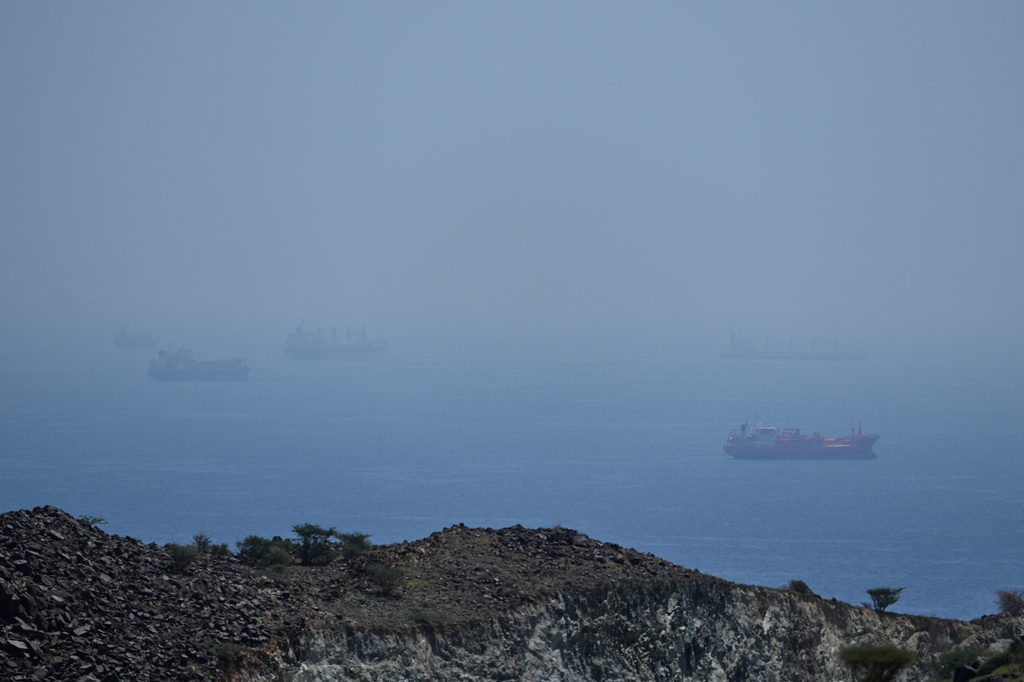 Tankers and bulk carriers anchored in the Strait of Hormuz, Saturday, April 18, 2026. (AP Photo)
