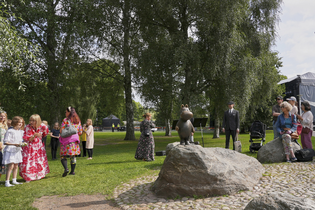 Finland Moomins Fans celebrate the 80th anniversary of the publication of the Finnish children's classic, "The Moomins and The Great Flood," and the birthday of the author Tove Jansson, in Tampere, Finland, Saturday, Aug. 9, 2025. (AP Photo/Tommi Ojala)