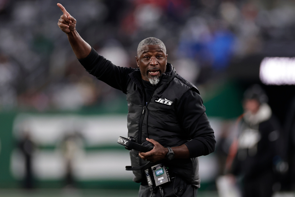 New York Jets head coach Aaron Glenn speaks to an official during the second half of an NFL football game against the Atlanta Falcons, Sunday, Nov. 30, 2025, in East Rutherford, N.J. (AP Photo/Adam Hunger)