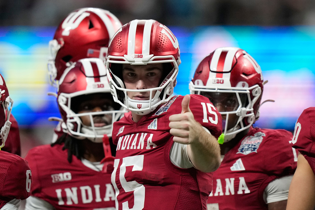 Indiana quarterback Fernando Mendoza (15) reacts during the second half of the Peach Bowl NCAA college football playoff semifinal against Oregon, Friday, Jan. 9, 2026, in Atlanta. (AP Photo/Brynn Anderson)