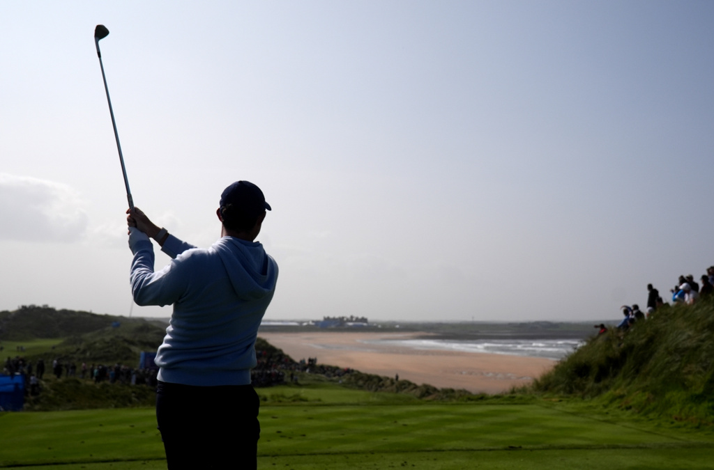 Rory McIlroy of Northern Ireland tees off the 14th on day two of the Irish Golf Open in Doonbeg, Ireland, Friday, Sept. 11, 2026. (Brian Lawless/PA via AP)