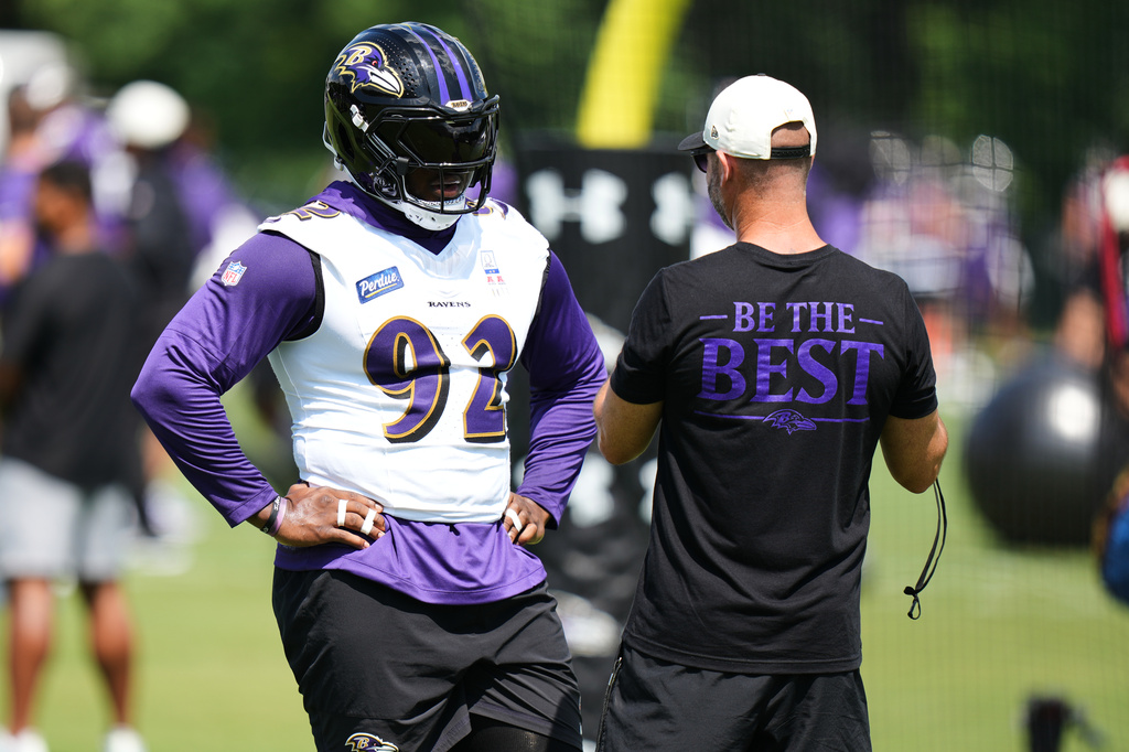 FILE - Baltimore Ravens defensive tackle Nnamdi Madubuike (92) works out during practice at the team's NFL football training camp, July 29, 2026, in Owings Mills, Md. (AP Photo/Stephanie Scarbrough, File)