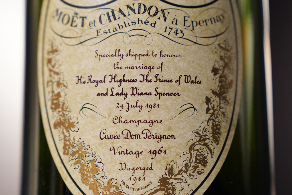 The label of a bottle of Dom Perignon Vintage 1961 champagne, specially produced for wedding of The Prince of Wales and Lady Diana in 1981, pictured in Lyngby, Denmark, Wednesday, Dec. 3, 2025. (AP Photo/James Brooks)x§