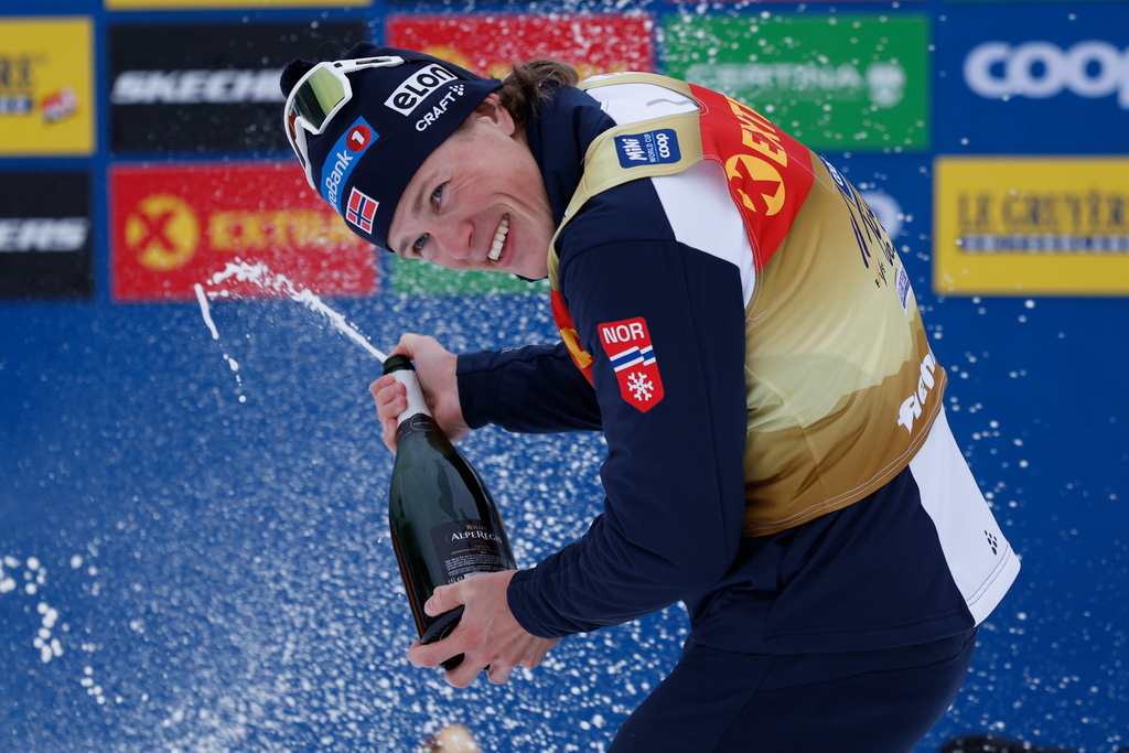 FILE - Tour de Ski winner Norway's Johannes Høsflot Klæbo, celebrates after the 10km men's mass start Tour de Ski cross-country race in Val di Fiemme, Italy, Jan. 5, 2025. (AP Photo/Alessandro Trovati, File)