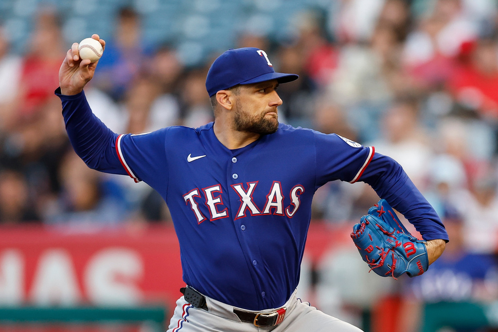 Texas Rangers starting pitcher Nathan Eovaldi delivers to the plate during the first inning of a baseball game, against the Los Angeles Angels, Saturday, May 23, 2026, in Anaheim, Calif. (AP Photo/Caroline Brehman)