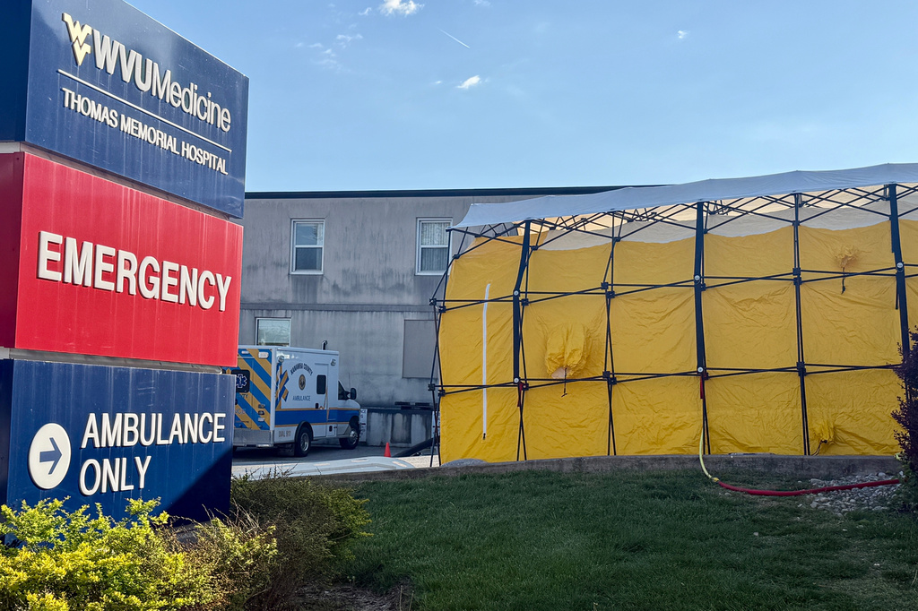 Following a chemical spill in the region, a decontamination tent is shown outside of WVU Medicine Thomas Memorial Hospital on Wednesday, April 22, 2026, in South Charleston, W.Va. (AP Photo/John Raby)