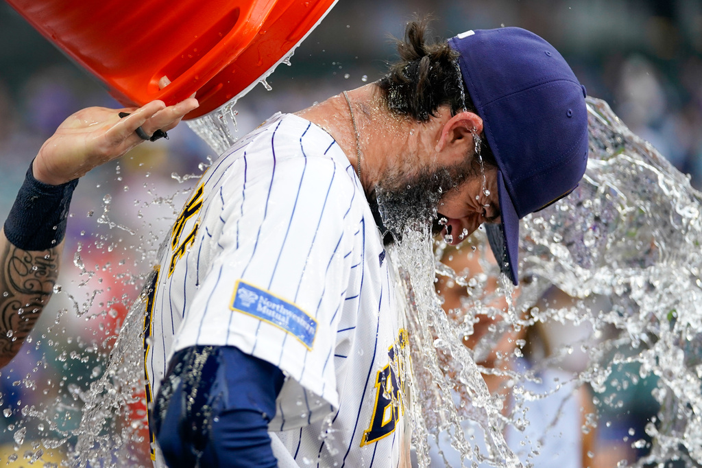 Milwaukee Brewers' Braden Shewmake is doused by Garrett Mitchell after winning a baseball game against the Miami Marlins Saturday, July 18, 2026, in Milwaukee. (AP Photo/Kayla Wolf)