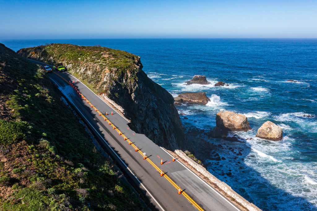 FILE - Cones mark a break in the southbound lane of Highway 1 at Rocky Creek Bridge in Big Sur, Calif., April 1, 2024. (AP Photo/Nic Coury, File)