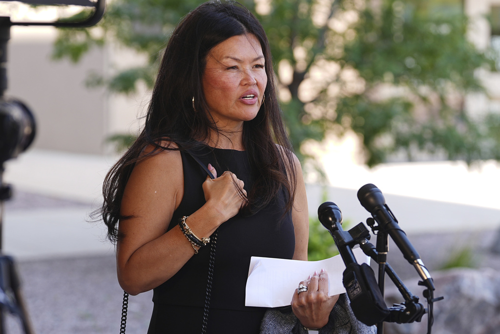Tanya Wilson responds to a reporter's question outside the El Paso County Courthouse after a judge ruled against accepting a plea deal in the case of a funeral home owner who stored roughly 189 decomposing bodies in a building Friday, Aug. 22, 2025, in Colorado Springs, Colo. (AP Photo/David Zalubowski)