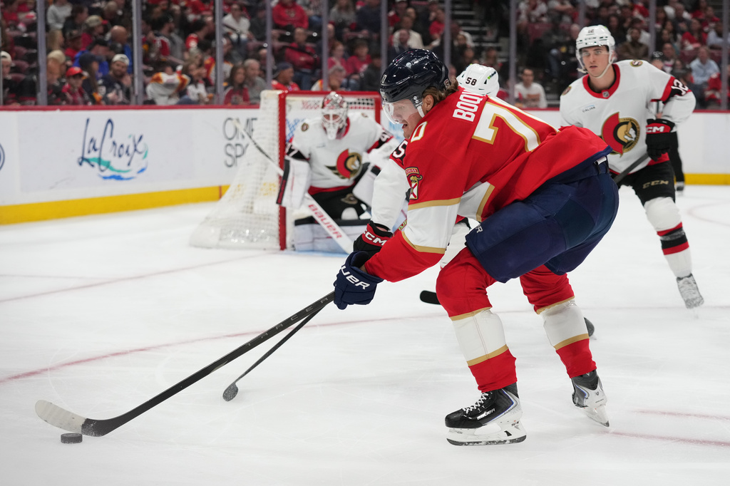 Florida Panthers center Jesper Boqvist (70) skates with the puck during the second period of an NHL hockey game against the Ottawa Senators, Tuesday, March 31, 2026, in Sunrise, Fla. (AP Photo/Lynne Sladky)