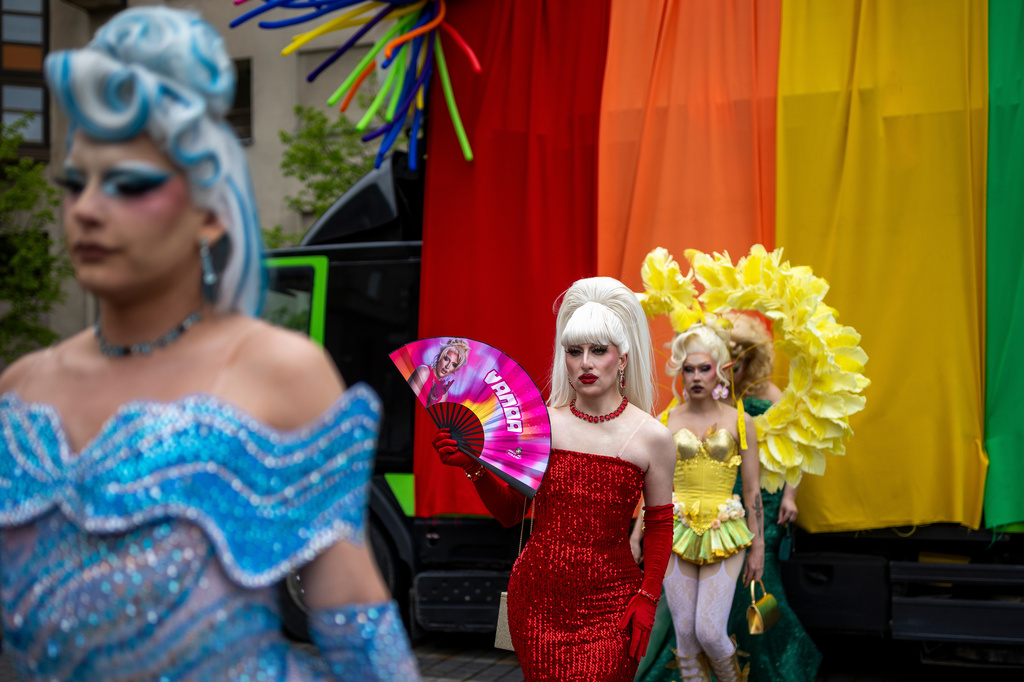 Revelers take part in a Pride parade in Vilnius, Lithuania, Saturday, June 6, 2026. (AP Photo/Mindaugas Kulbis)