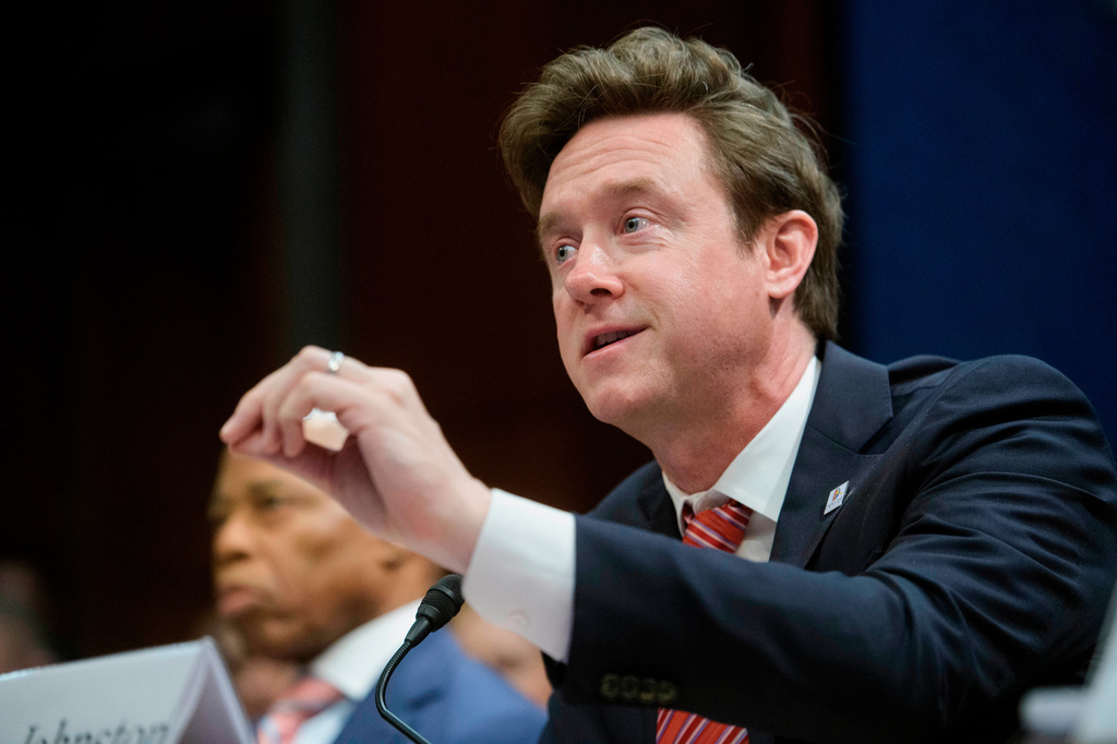 FILE - Denver Mayor Mike Johnston responds to questions during a House Committee on Oversight and Government Reform hearing with Sanctuary City Mayors on Capitol Hill, March 5, 2025, in Washington. (AP Photo/Rod Lamkey, Jr., File)