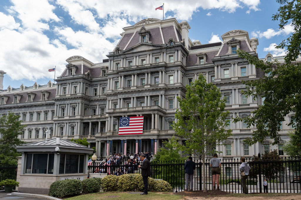 The Eisenhower Executive Office Building is seen as President Donald Trump speaks during an event to announce the Freedom Haulers initiative at the White House, Thursday, July 30, 2026, in Washington. (AP Photo/Julia Demaree Nikhinson)