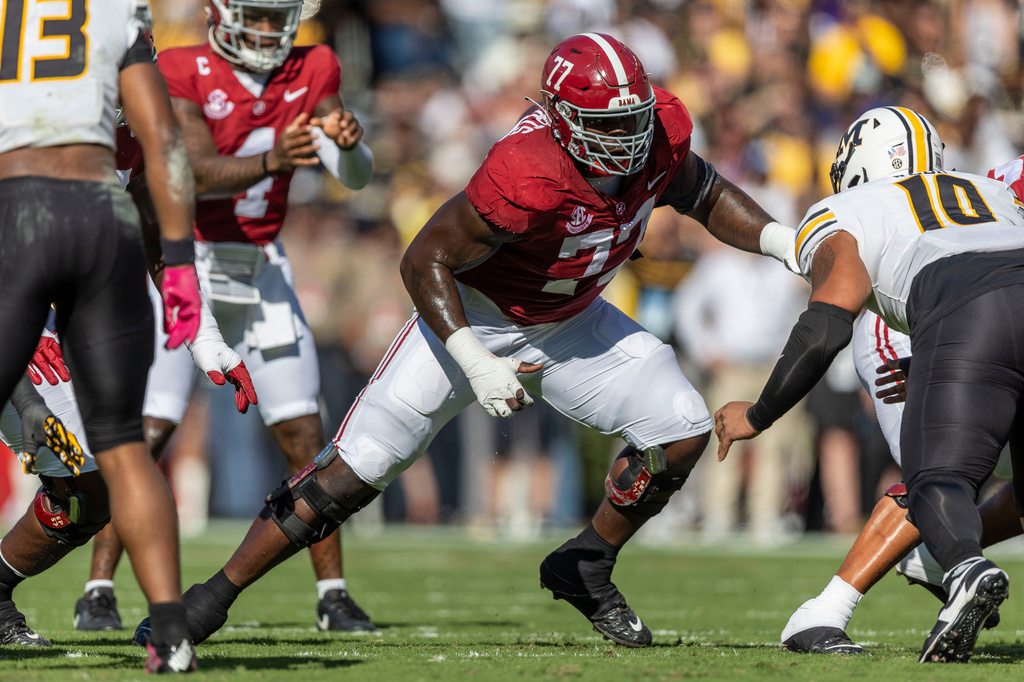FILE - Alabama offensive lineman Jaeden Roberts (77) blocks Missouri defensive tackle Sterling Webb (10) during the first half of an NCAA college football game, Saturday, Oct. 26, 2024, in Tuscaloosa, Ala. (AP Photo/Vasha Hunt, File)