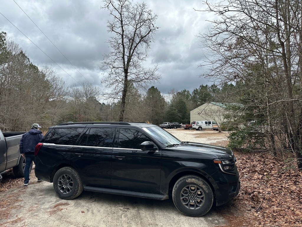 A vehicle blocks access to a property in Cameron, N.C., Sunday, Feb. 22, 2026. (AP Photo/Allen G. Breed)