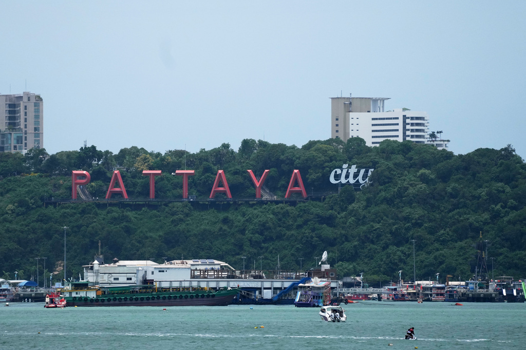 Tourists ride a jet ski on Pattaya Beach in Pattaya, Thailand, on Aug. 31, 2026. (AP Photo/Sakchai Lalit)