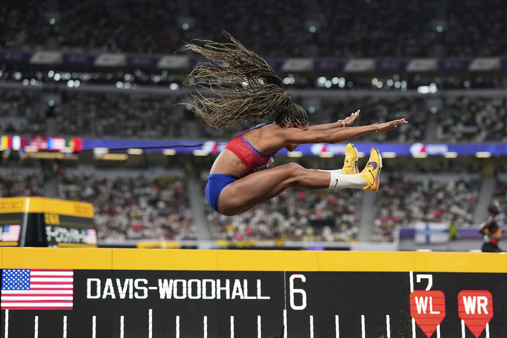 United States' Tara Davis-Woodhall competes in the women's long jump final at the World Athletics Championships in Tokyo, Sunday, Sept. 14, 2025. (AP Photo/Ashley Landis)