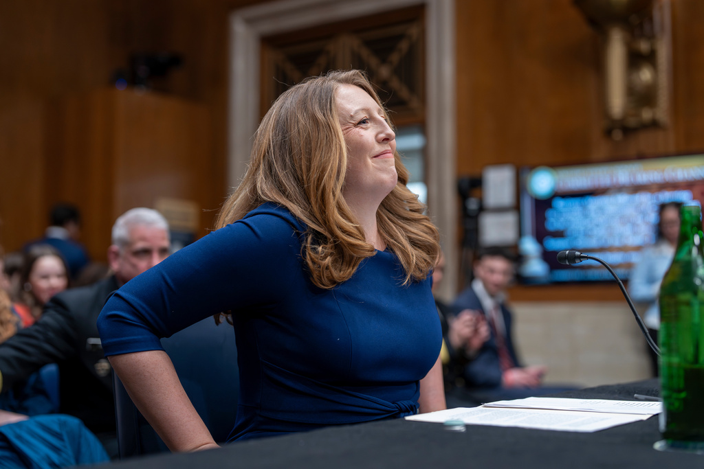 Wellness influencer and entrepreneur Dr. Casey Means takes her seat before the Senate health committee as she seeks approval to be U.S. surgeon general, at the Capitol in Washington, Wednesday, Feb. 25, 2026. (AP Photo/J. Scott Applewhite)