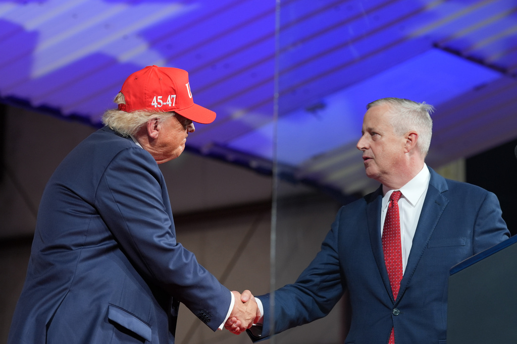 President Donald Trump greets North Carolina Republican U.S. Senate candidate Michael Whatley during a rally at Gastonia Municipal Airport, Wednesday, Sept. 16, 2026, in Gastonia, N.C. (AP Photo/Alex Brandon)