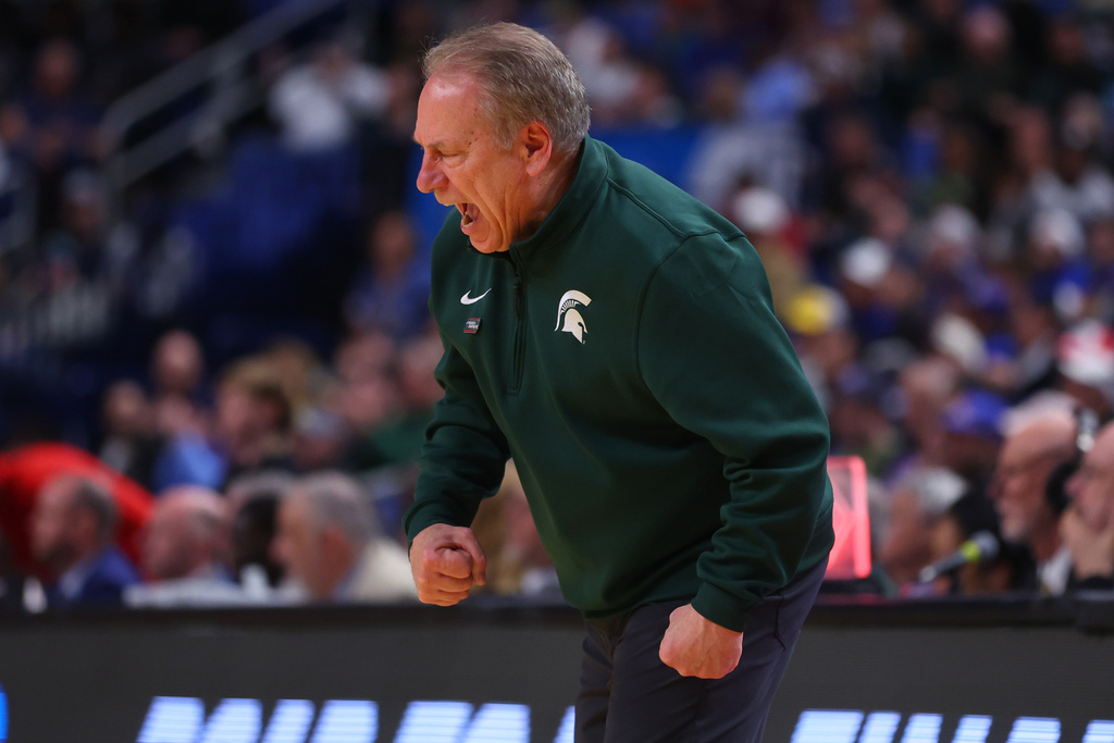 Michigan State head coach Tom Izzo celebrates during the second half against Louisville in the second round of the NCAA college basketball tournament, Saturday, March 21, 2026, in Buffalo, N.Y. (AP Photo/Jeffrey T. Barnes)