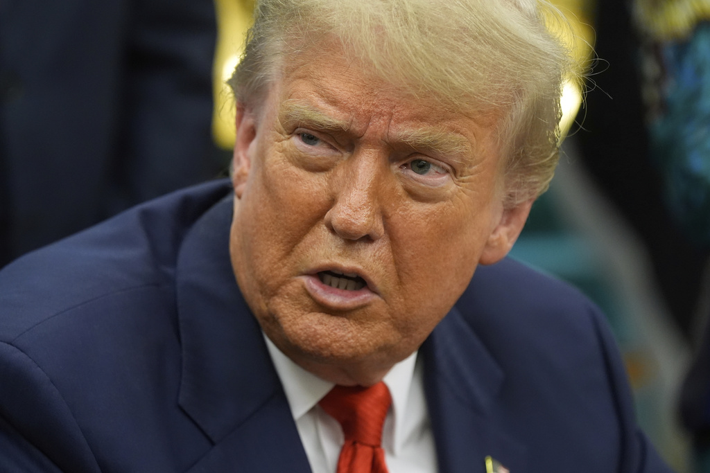 FILE - President Donald Trump answers questions from reporters as he meets with Congo's Foreign Minister Therese Kayikwamba Wagner, and Rwanda's Foreign Minister Olivier Nduhungirehe, Friday, June 27, 2025, in the Oval Office at the White House in Washington. (AP Photo/Manuel Balce Ceneta, File)