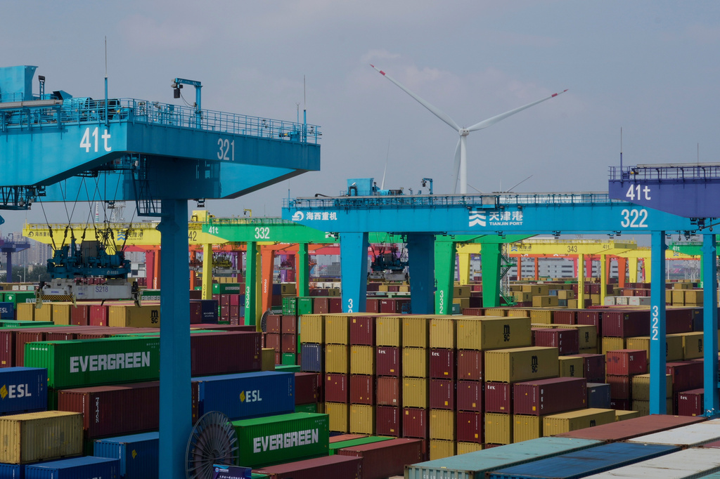 FILE - Shipping containers are stacked at a port in Tianjin, China, Friday, Aug. 29, 2025. (AP Photo/Mahesh Kumar A., file)