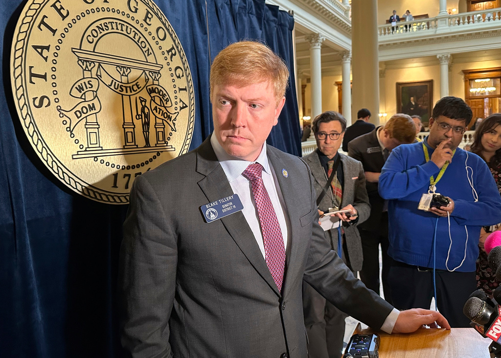 FILE - Georgia Sen. Blake Tillery, R-Vidalia, listens to a reporter's question following Senate passage of a bill limiting state funding of gender affirming care on Tuesday, Feb. 11, 2025, at the Georgia Capitol in Atlanta. (AP Photo/Jeff Amy, file)