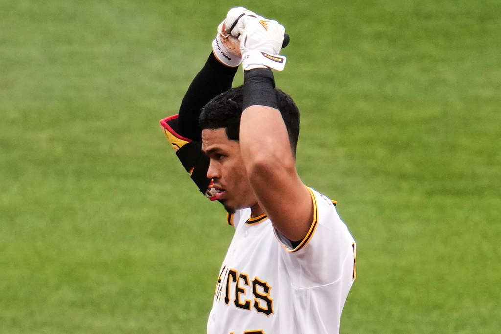 Pittsburgh Pirates' Endy Rodriguez celebrates after driving in two runs with a single off Colorado Rockies pitcher Chase Dollander in the third inning of a baseball game in Pittsburgh, Thursday, May 14, 2026. (AP Photo/Gene J. Puskar)