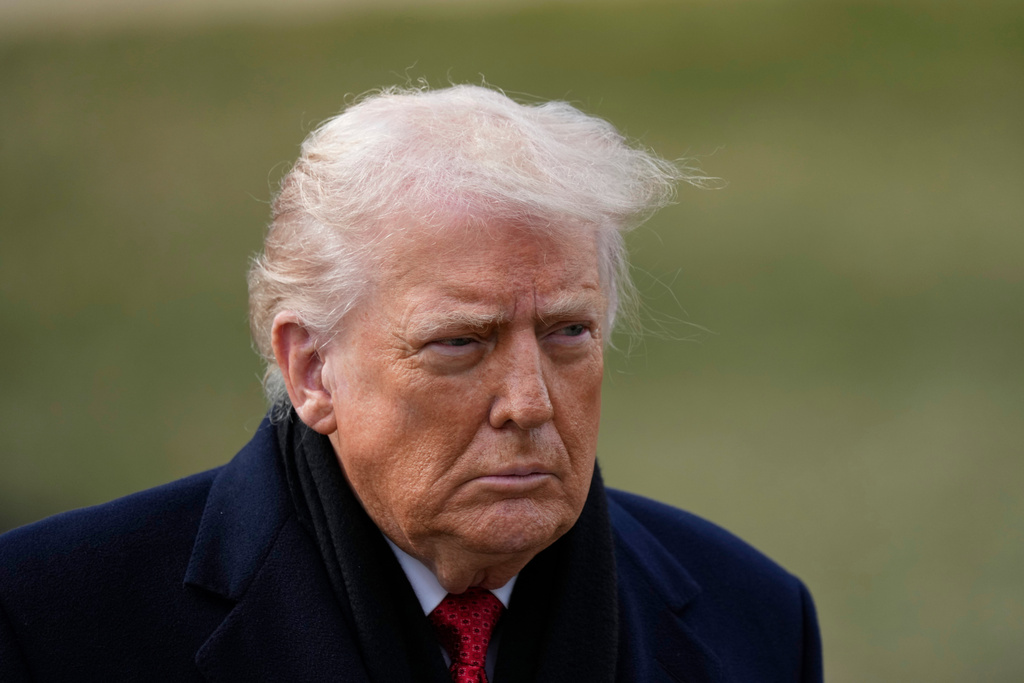 President Donald Trump walks to Marine One for departure from the South Lawn of the White House, Friday, Jan. 16, 2026, in Washington. (AP Photo/Alex Brandon)
