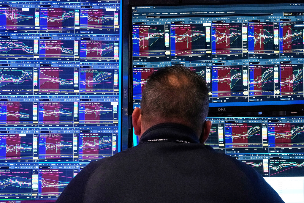 Specialist Anthony Matesic works at his post on the floor of the New York Stock Exchange, Monday, Feb. 2, 2026. (AP Photo/Richard Drew)