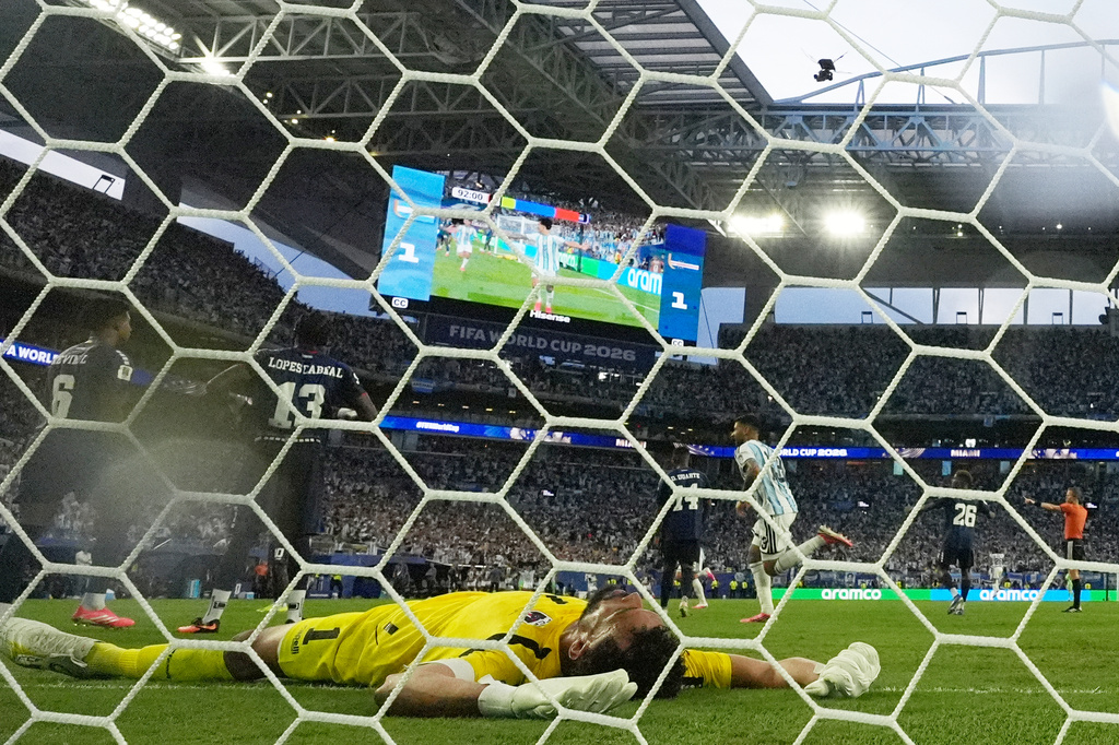 Cape Verde goalkeeper Vozinha (1) reacts after Argentina's Lisandro Martinez scored a goal during the World Cup round of 32 soccer match between Argentina and Cape Verde in Miami Gardens, Fla., Friday, July 3, 2026. (AP Photo/Lynne Sladky)