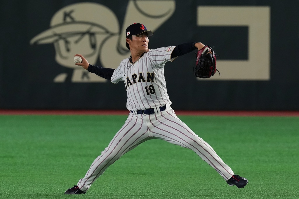 Japan's pitcher Yoshinobu Yamamoto participates in their practice session in Tokyo, Wednesday, March 4, 2026, ahead of their World Baseball Classic games. (AP Photo/Hiro Komae)