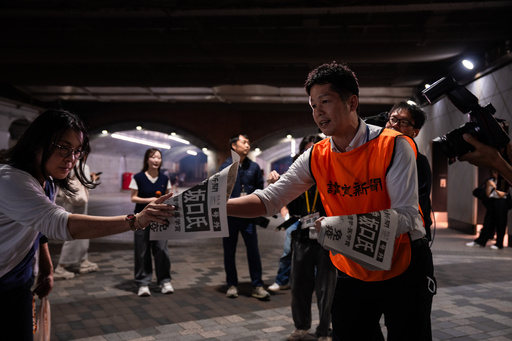 Staff from Japan's Yomiuri Shimbun distributes extra editions reporting on Japanese Dr. Shimon Sakaguchi winning the Nobel Prize in medicine, along with scientists Mary E. Brunkow and Fred Ramsdell, for their discoveries concerning peripheral immune tolerance, in Tokyo, Monday, Oct 6, 2025. (AP Photo/Louise Delmotte) Staff from Japan's Yomiuri Shimbun distributes extra editions reporting on Japanese Dr. Shimon Sakaguchi winning the Nobel Prize in medicine, along with scientists Mary E. Brunkow and Fred Ramsdell, for their discoveries concerning peripheral immune tolerance, in Tokyo, Monday, Oct 6, 2025. (AP Photo/Louise Delmotte)