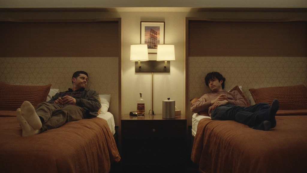 This image released by Roadside Attractions shows Dylan O'Brien, left, and James Sweeney in a scene from "Twinless." (Roadside Attractions via AP)