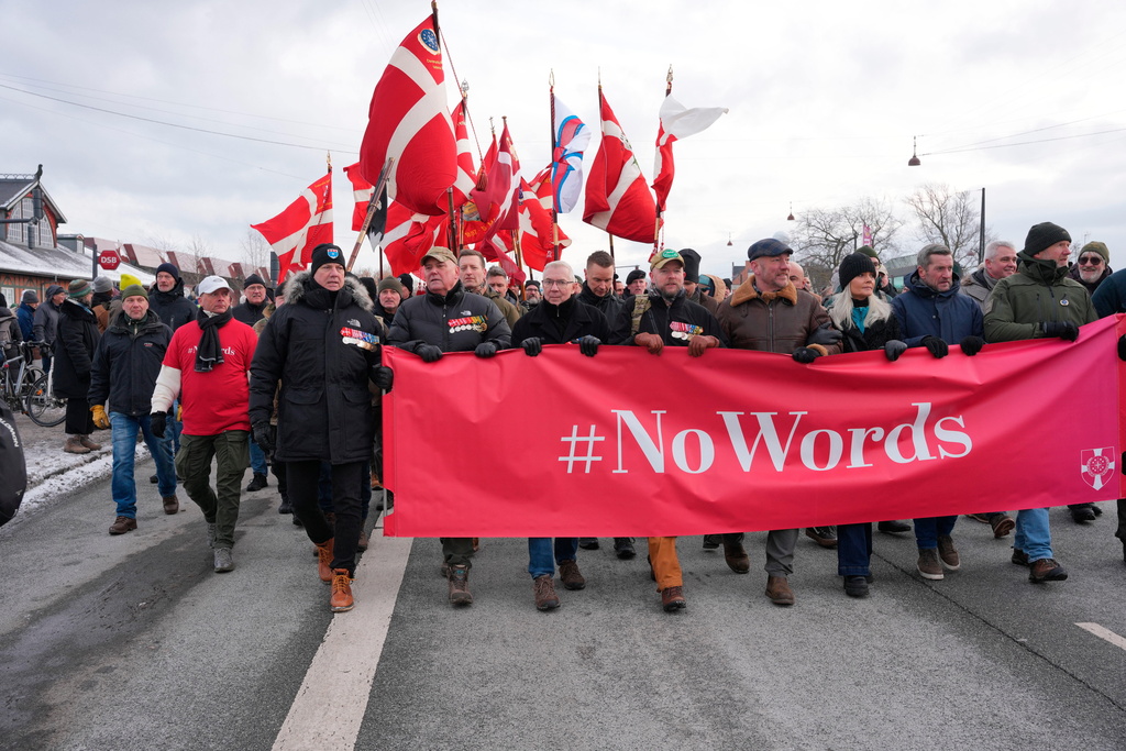 Hundreds of Danish veterans, many of whom fought alongside U.S. troops, stage a silent protest as they march from Kastellet to the American embassy in Copenhagen on Saturday, Jan. 31, 2026. (Emil Helms/Ritzau Scanpix via AP)