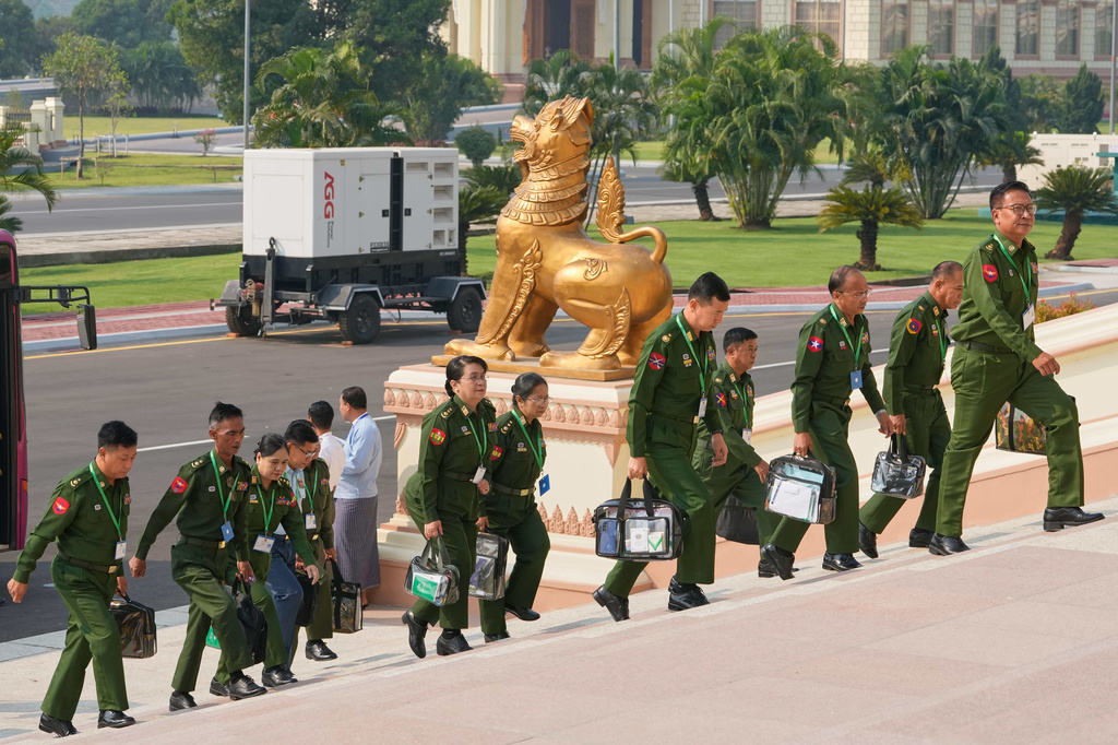 Myanmar's military representatives arrive for a session at Union parliament in Naypyitaw, Myanmar, Friday, April 3, 2026. (AP Photo/Aung Shine Oo)