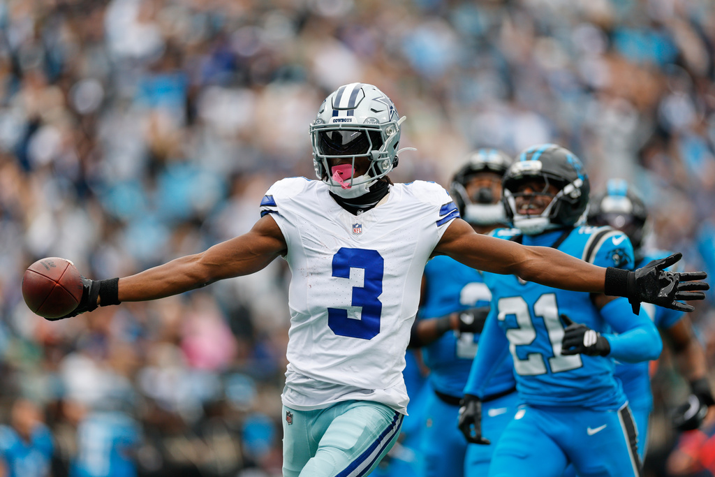 Dallas Cowboys wide receiver George Pickens (3) celebrates his touchdown catch in the second half of an NFL football game against the Carolina Panthers, Sunday, Oct. 12, 2025, in Charlotte, N.C. (AP Photo/Rusty Jones)