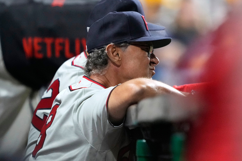 Philadelphia Phillies interim manager Don Mattingly watches from the dugout during the seventh inning of a baseball game against the Minnesota Twins at the Field of Dreams movie site, Thursday, Aug. 13, 2026, in Dyersville, Iowa. (AP Photo/Charlie Neibergall)