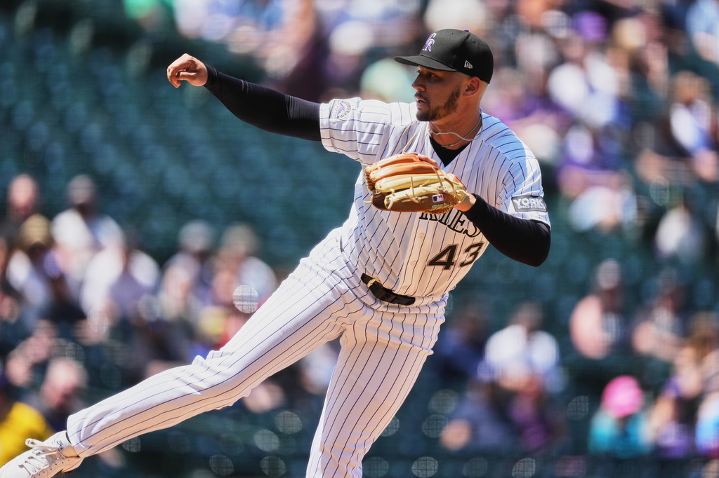 Colorado Rockies starting pitcher Gabriel Hughes works against the Washington Nationals in the first inning of a baseball game Wednesday, July 22, 2026, in Denver. (AP Photo/David Zalubowski)