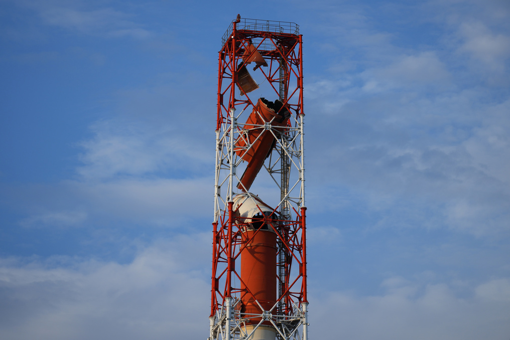 A damaged smokestack is seen at the Nippon Paper Industries Co.'s plant in Yatsushiro, southwestern Japan, Wednesday, July 29, 2026, the day after an earthquake hit the area. (AP Photo/Hiro Komae)
