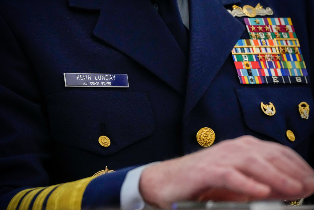 The name tag and ribbons of Adm. Kevin Lunday, acting commandant of the U.S. Coast Guard, are visible as he speaks during a Senate Commerce, Science and Transportation Committee hearing on his nomination for Commandant of the Coast Guard, Wednesday, Nov. 19, 2025, on Capitol Hill in Washington. (AP Photo/Julia Demaree Nikhinson)