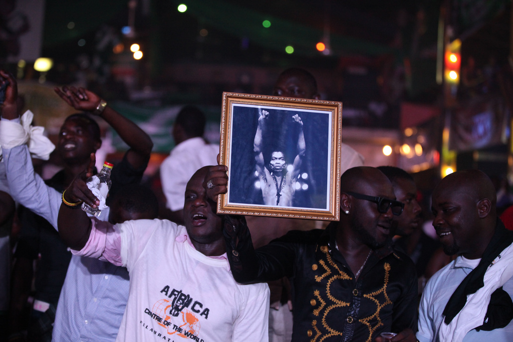 FILE - Afrobeat fans attend a celebration at the New Afrika Shrine in Lagos, Nigeria, Sunday, Oct. 21, 2012. (AP Photo/Sunday Alamba, File)