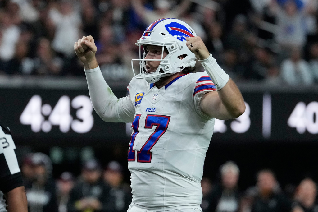 Buffalo Bills quarterback Josh Allen (17) celebrates a touchdown against the Las Vegas Raiders during the second half of an NFL football game in Las Vegas, Sunday, Oct. 18, 2026. (AP Photo/John Locher)