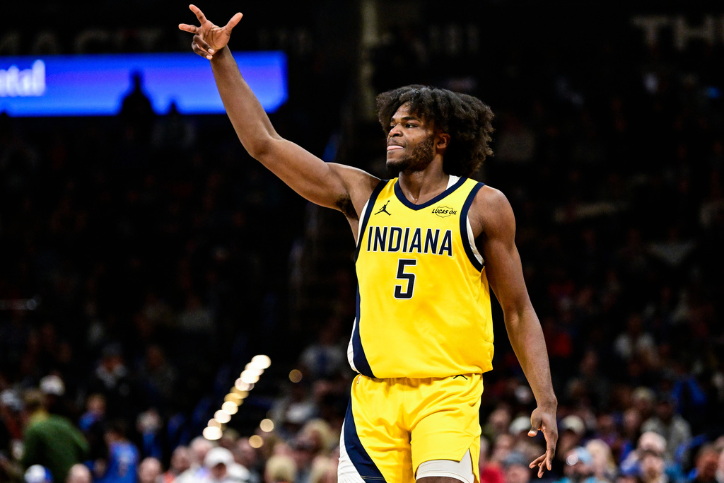 Indiana Pacers forward Jarace Walker gestures during the second half of an NBA basketball game against the Oklahoma City Thunder, Friday, Jan. 23, 2026, in Oklahoma City. (AP Photo/Gerald Leong)