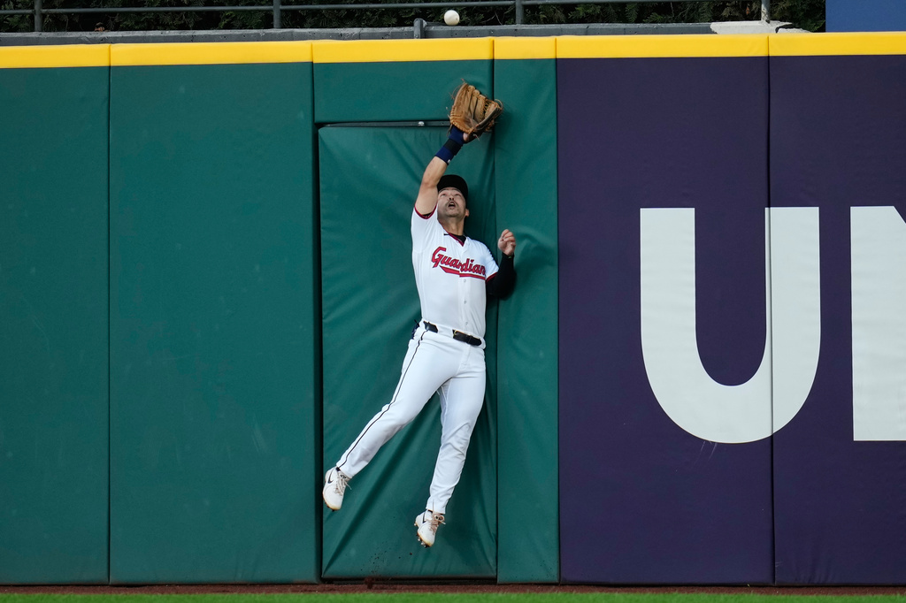 Cleveland Guardians center fielder Steven Kwan catches a fly ball for an out on a ball hit by Baltimore Orioles' Taylor Ward in the third inning of a baseball game in Cleveland, Thursday, April 16, 2026. (AP Photo/Sue Ogrocki)